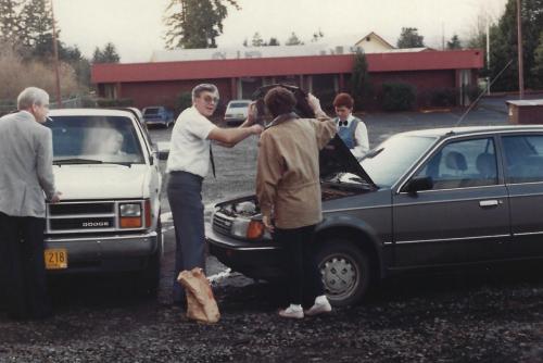 John-helping-a-customer-car